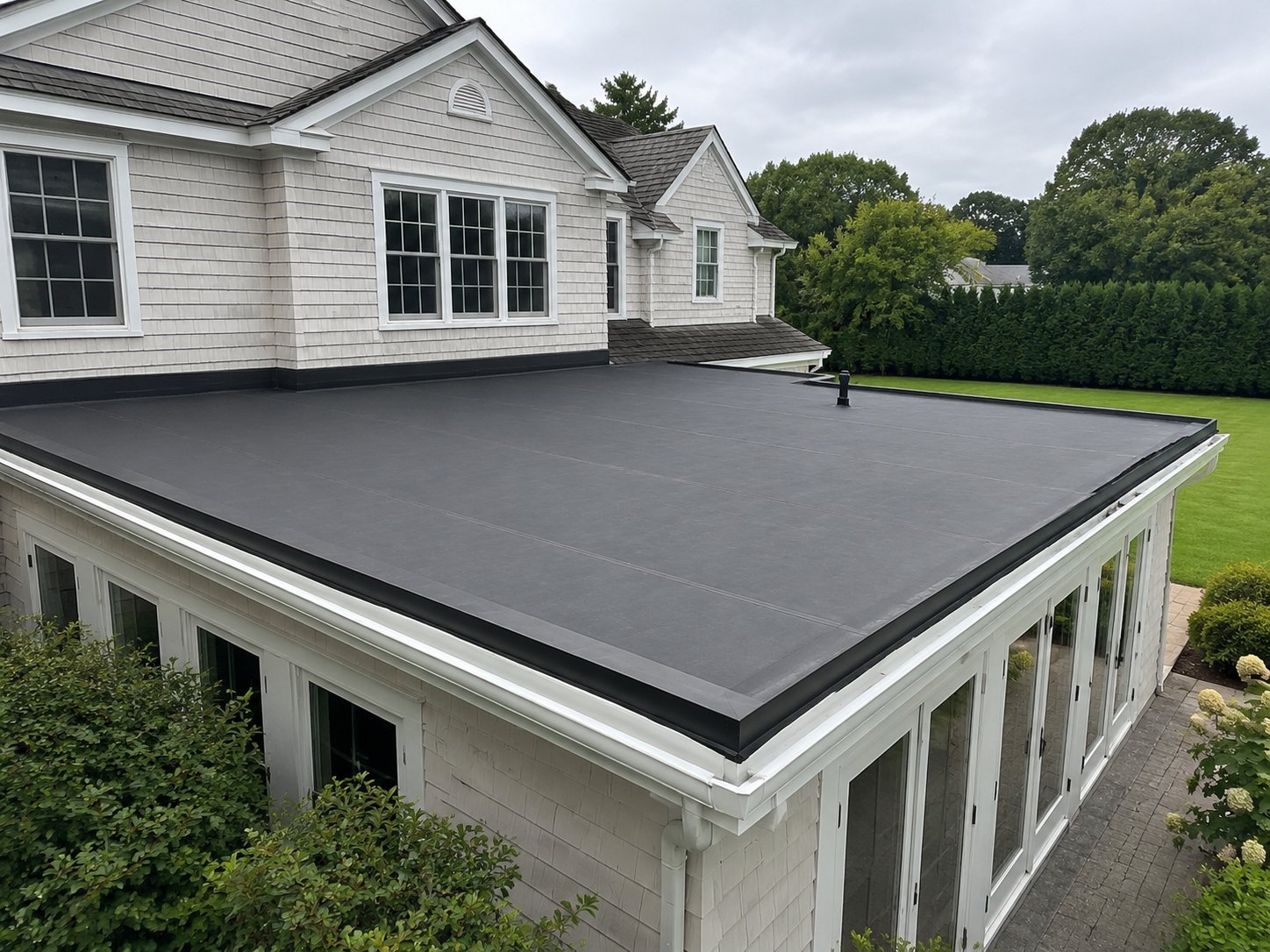 EPDM flat roof over a rear sunroom addition, Suffolk County