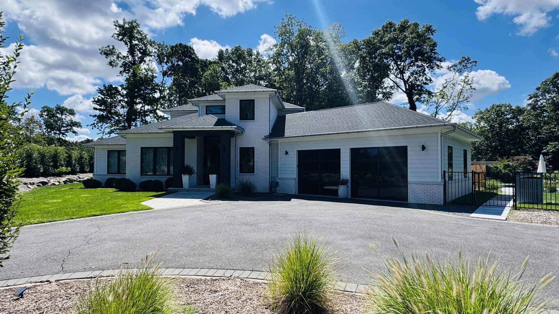 Finished asphalt shingle roof on a Suffolk County home